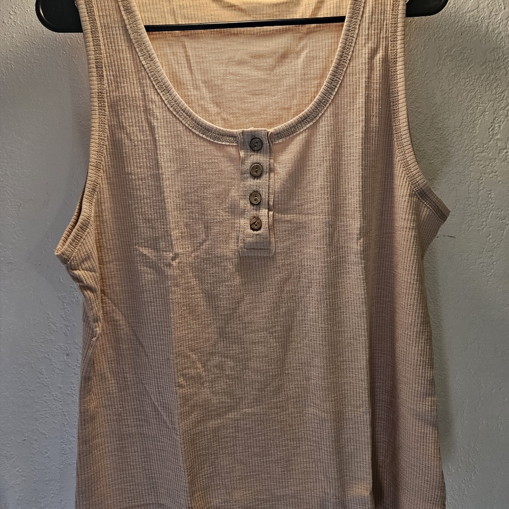 New in package ribbed tank woman's 2XL. Buy 1 Article Of Clothing, Get 1 Free